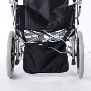 A dignified oxford cloth wheelchair catheter bag hangs securely under the wheelchair, concealing the urine drainage bag and providing safe storage for tubing.