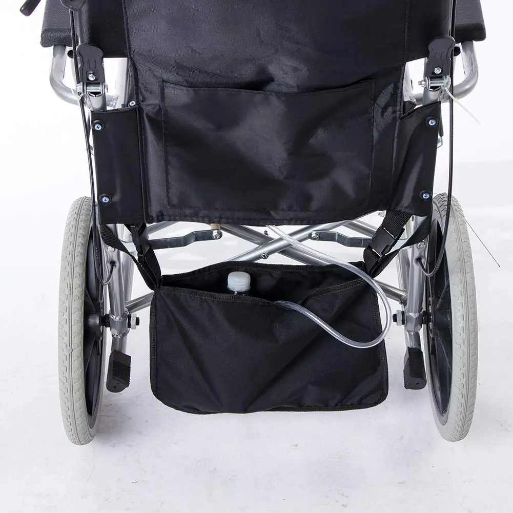 A dignified oxford cloth wheelchair catheter bag hangs securely under the wheelchair, concealing the urine drainage bag and providing safe storage for tubing.
