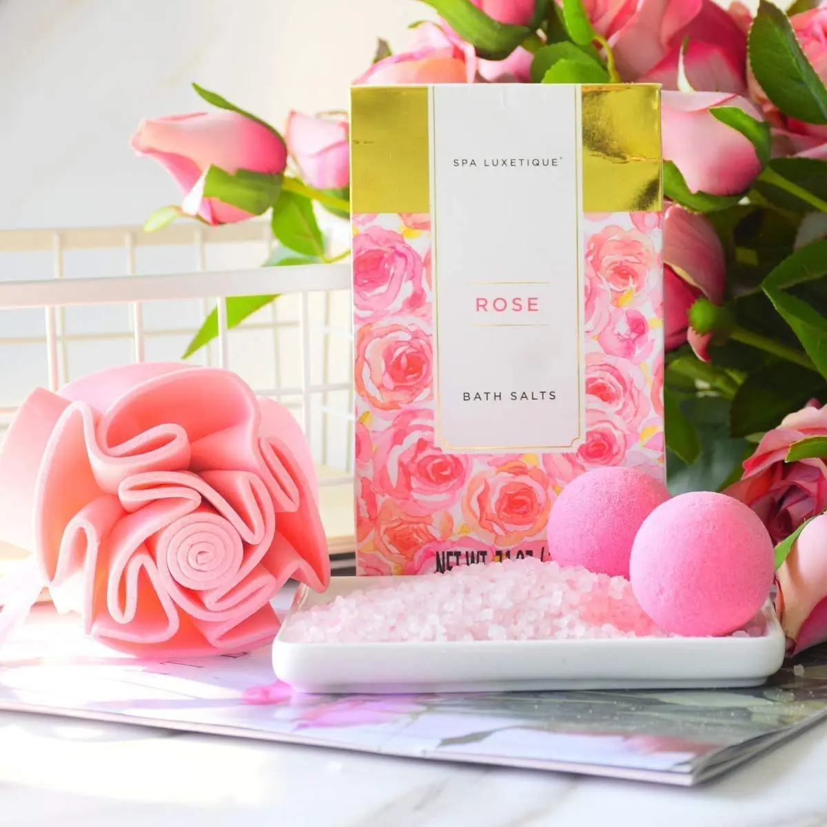 This 10-piece rose spa gift set for women is the perfect birthday gift, featuring sunflower and rose oil infused skincare items including bath bombs, lotion, and shower gel, all packaged in a high-value tote bag.
