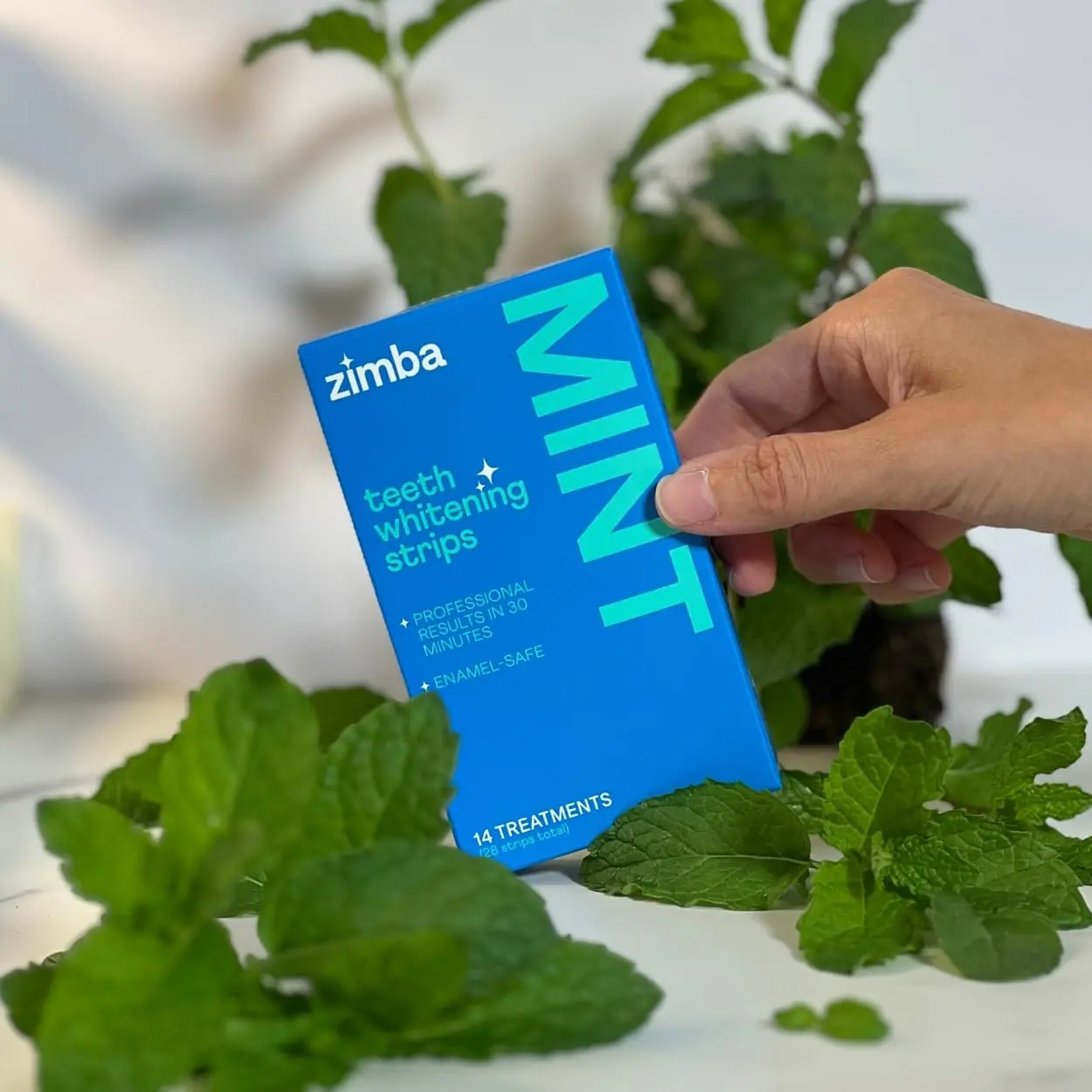 ZIMBA mint flavored teeth whitening strips gently and effectively remove stains, with natural ingredients and reduced sensitivity for a brighter, whiter smile.