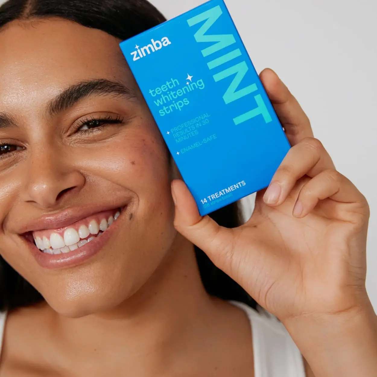 ZIMBA mint flavored teeth whitening strips gently and effectively remove stains, with natural ingredients and reduced sensitivity for a brighter, whiter smile.