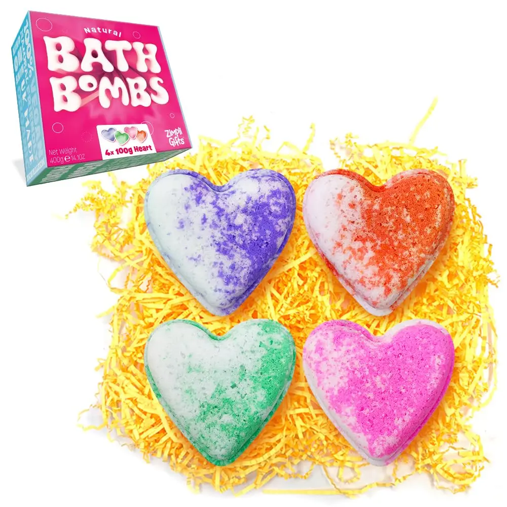 This is a set of four large, love heart-shaped Zimpli Gifts bath bombs, a fizzy spa moisturizing gift set made in the UK that's vegan friendly and ideal for birthdays and anniversaries, perfect for women with dry skin.