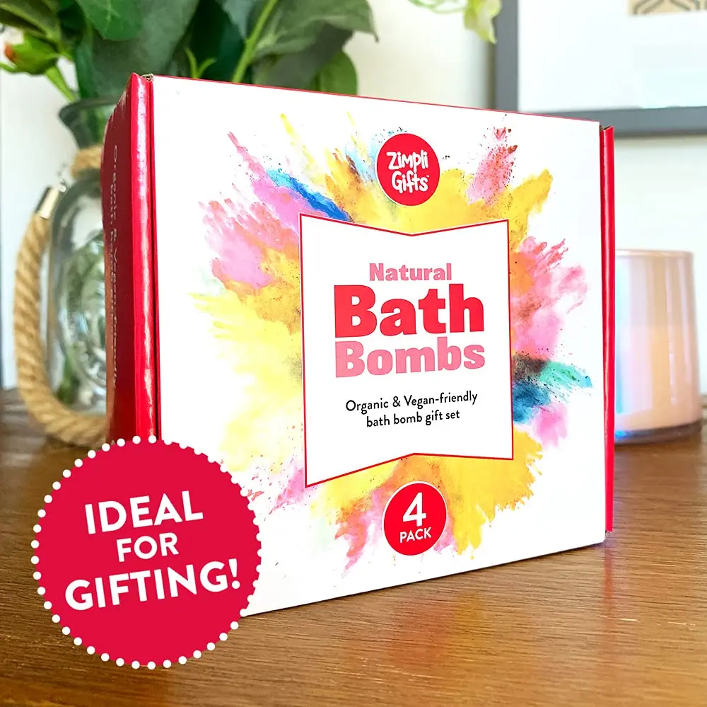 This is a set of four large, love heart-shaped Zimpli Gifts bath bombs, a fizzy spa moisturizing gift set made in the UK that's vegan friendly and ideal for birthdays and anniversaries, perfect for women with dry skin.